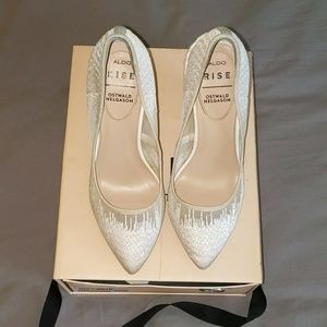 Aldo rise block heel pumps